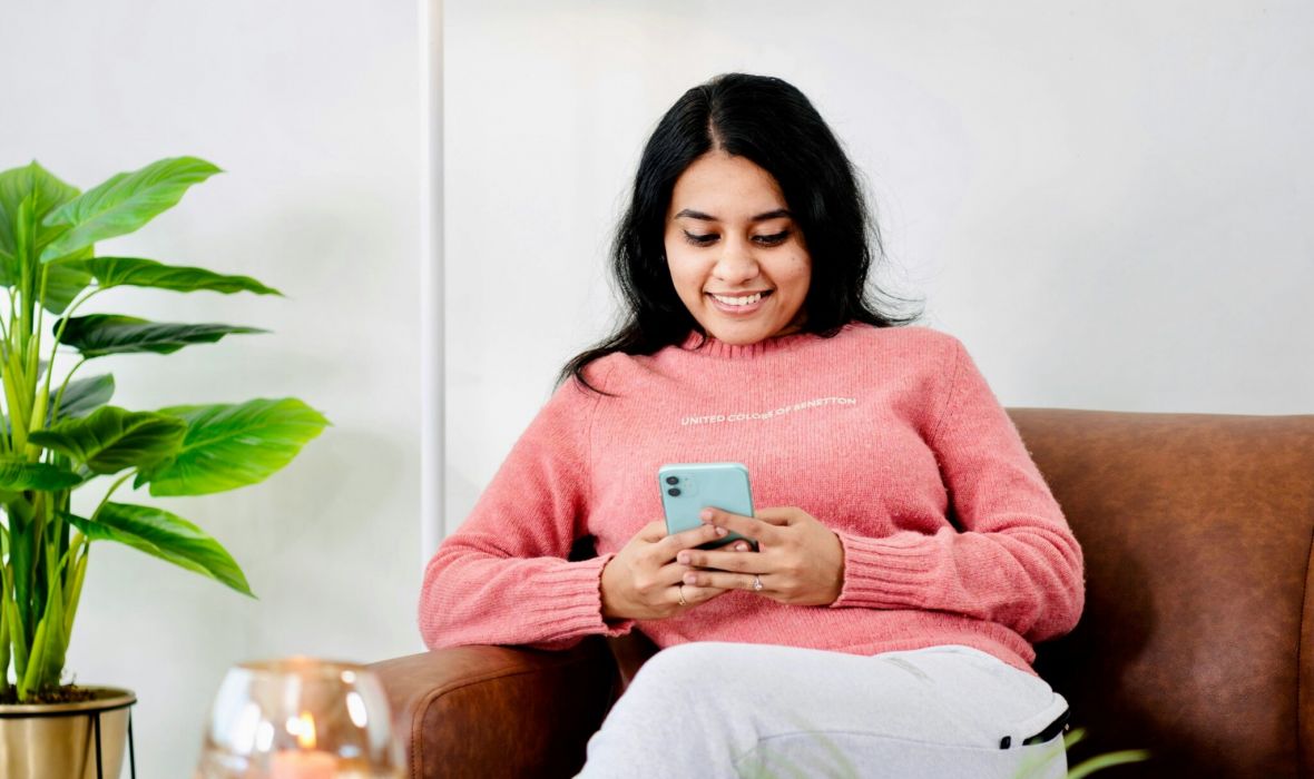 The Lodges of Huntersville A man and woman are grilling food together outdoors, enjoying a sunny day and preparing a meal.